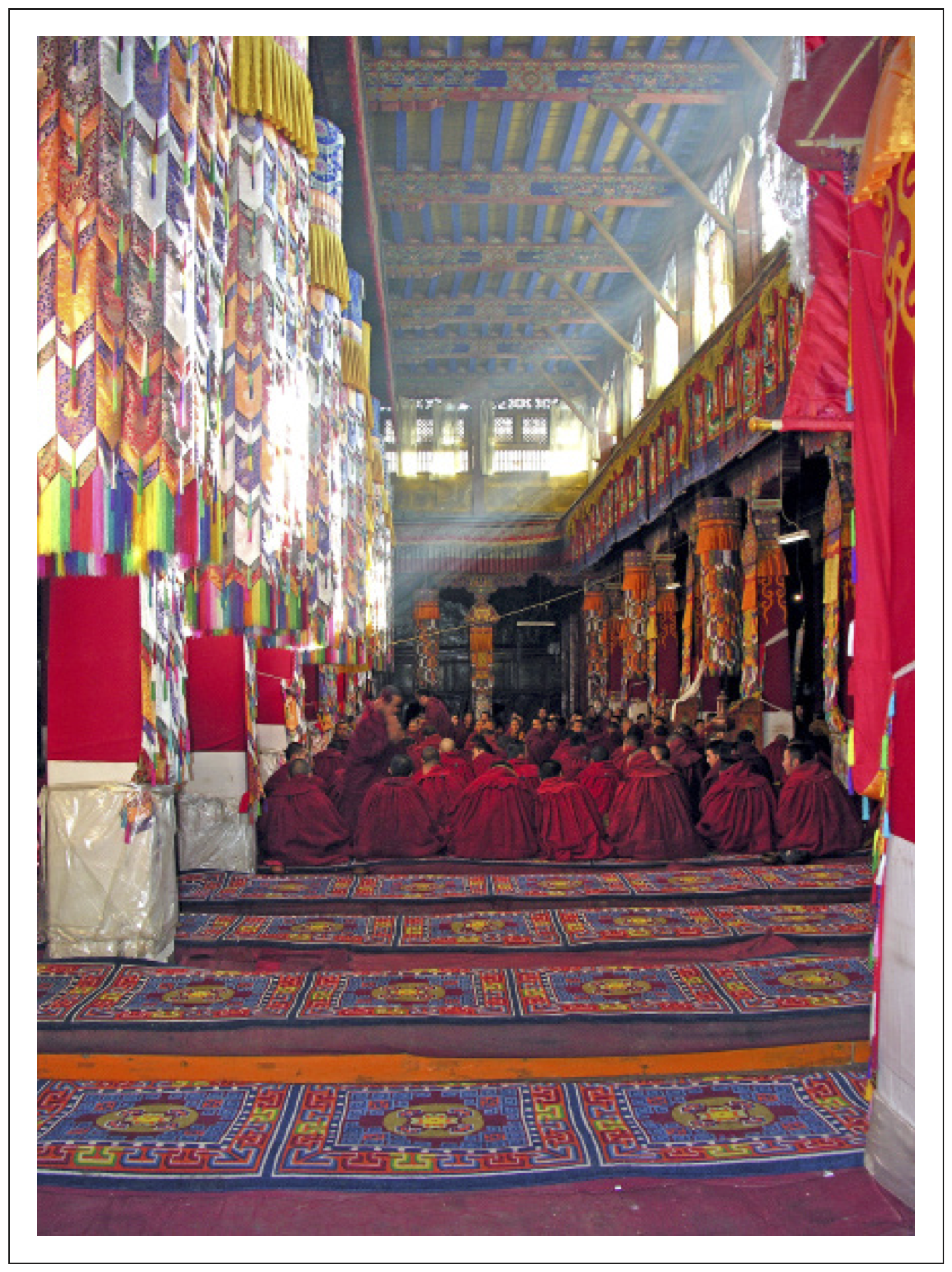 Tibetan Buddhist Monks in the great assembly hall at Drepung Monastery, Lhasa, Tibet